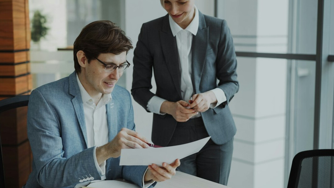 executive reviewing reports