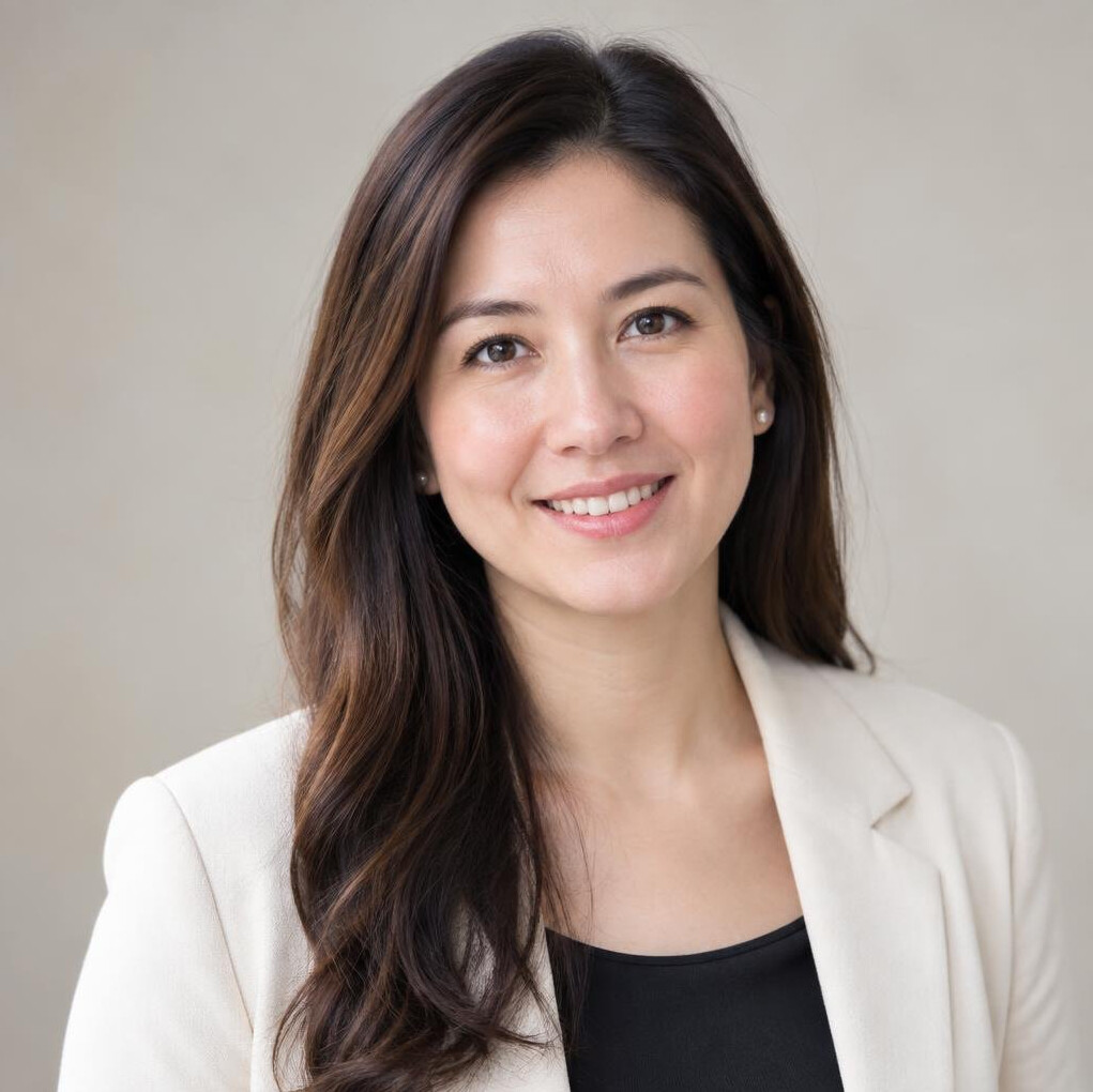 Studio portrait of a Eurasian Singaporean woman in business casual clothing