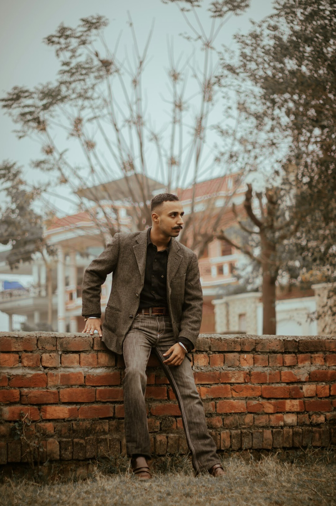 Studio portrait of a Malay Singaporean man in smart casual attire