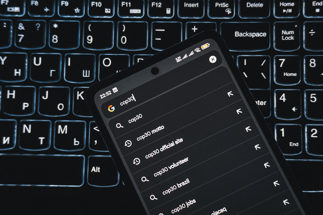Open laptop displaying a code editor with a dark theme