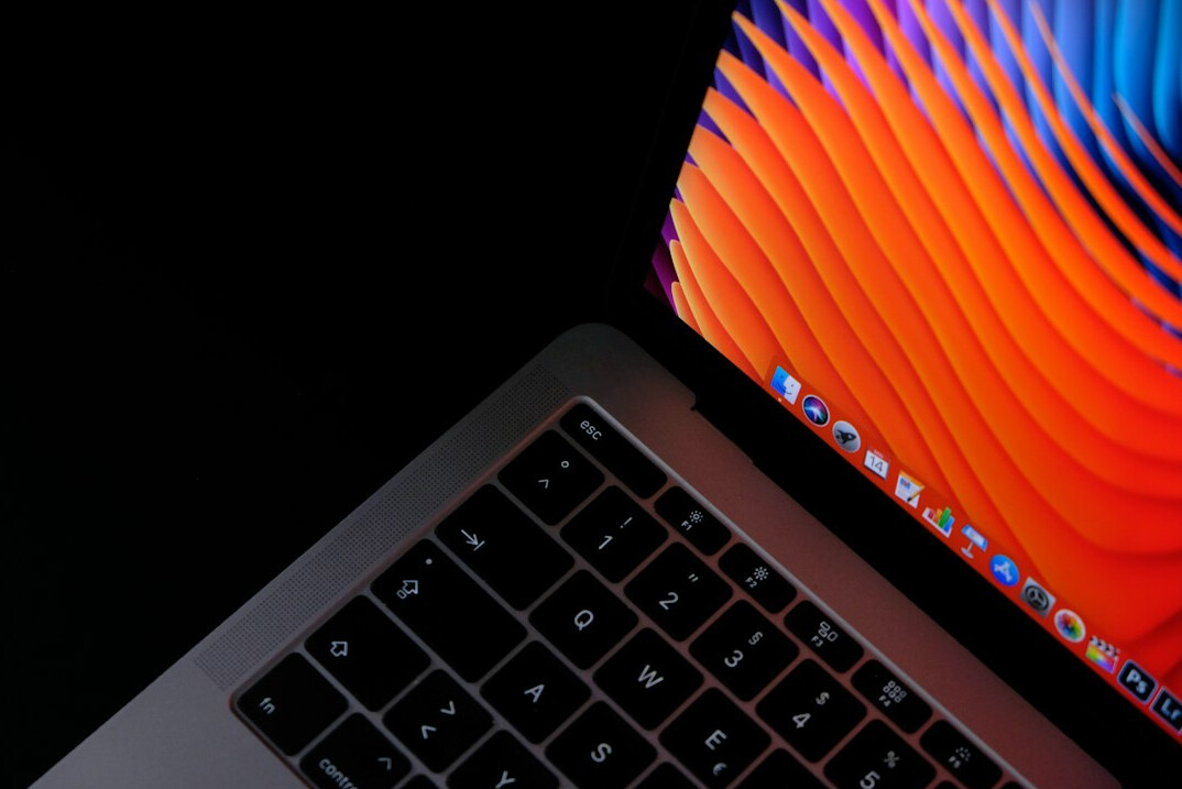 Close-up of a laptop screen displaying lines of software code